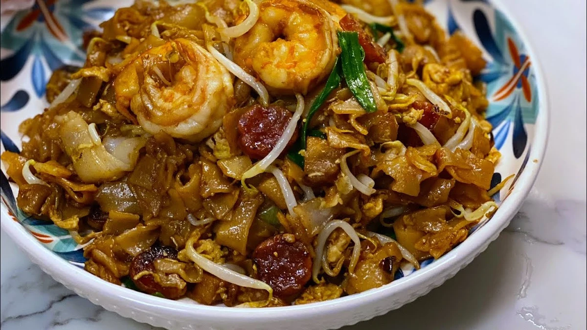 মালয়েশিয়ার স্ট্রিট ফুডের স্বাদ এখন আপনার রান্নাঘরে! চার কুয়েই টিও রেসিপি